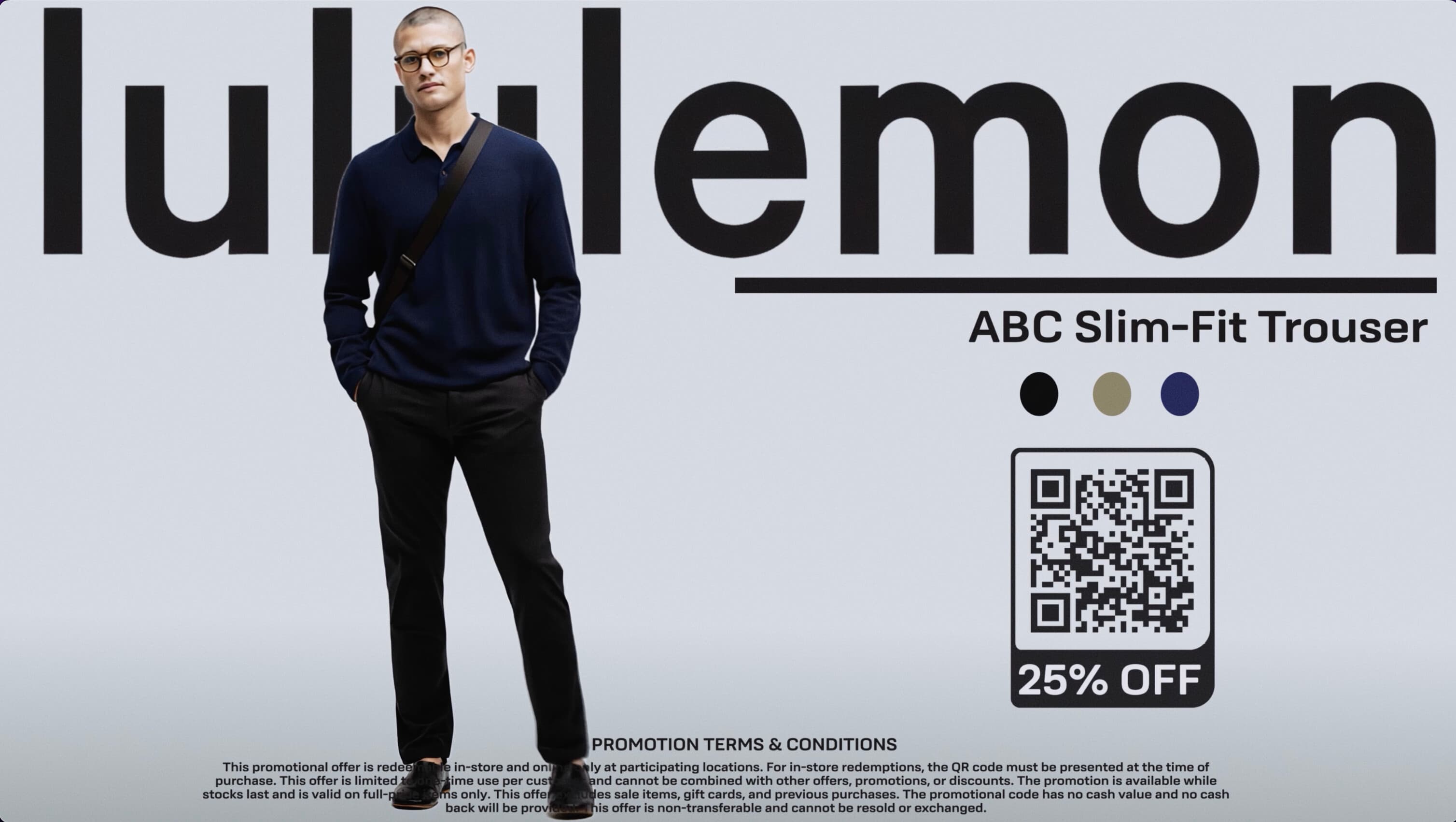 lululemon ABC Slim-Fit Trouser promo: man in a navy shirt and dark trousers