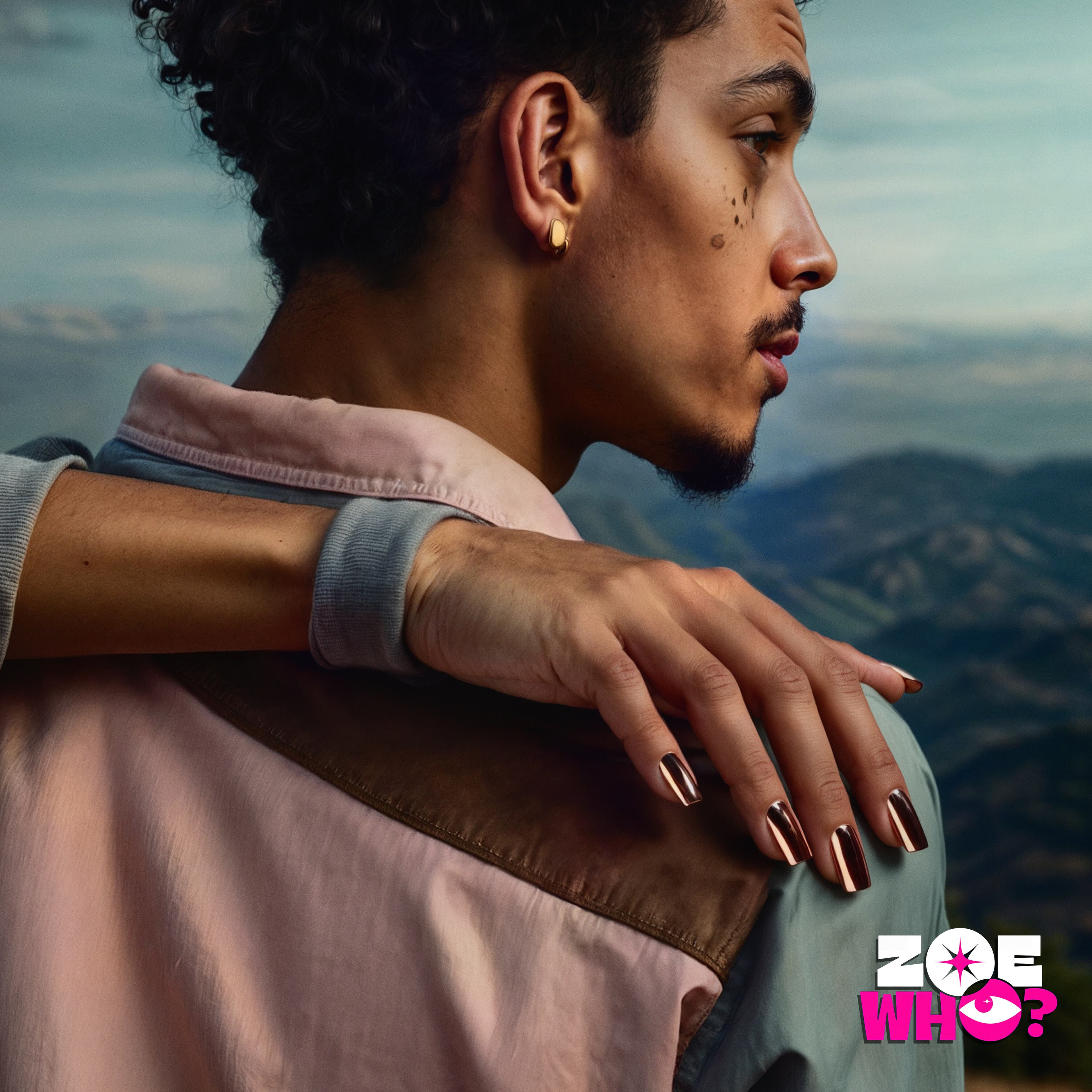 Zoe Who? nail art: hand with bronze nails resting on a shoulder, mountains behind