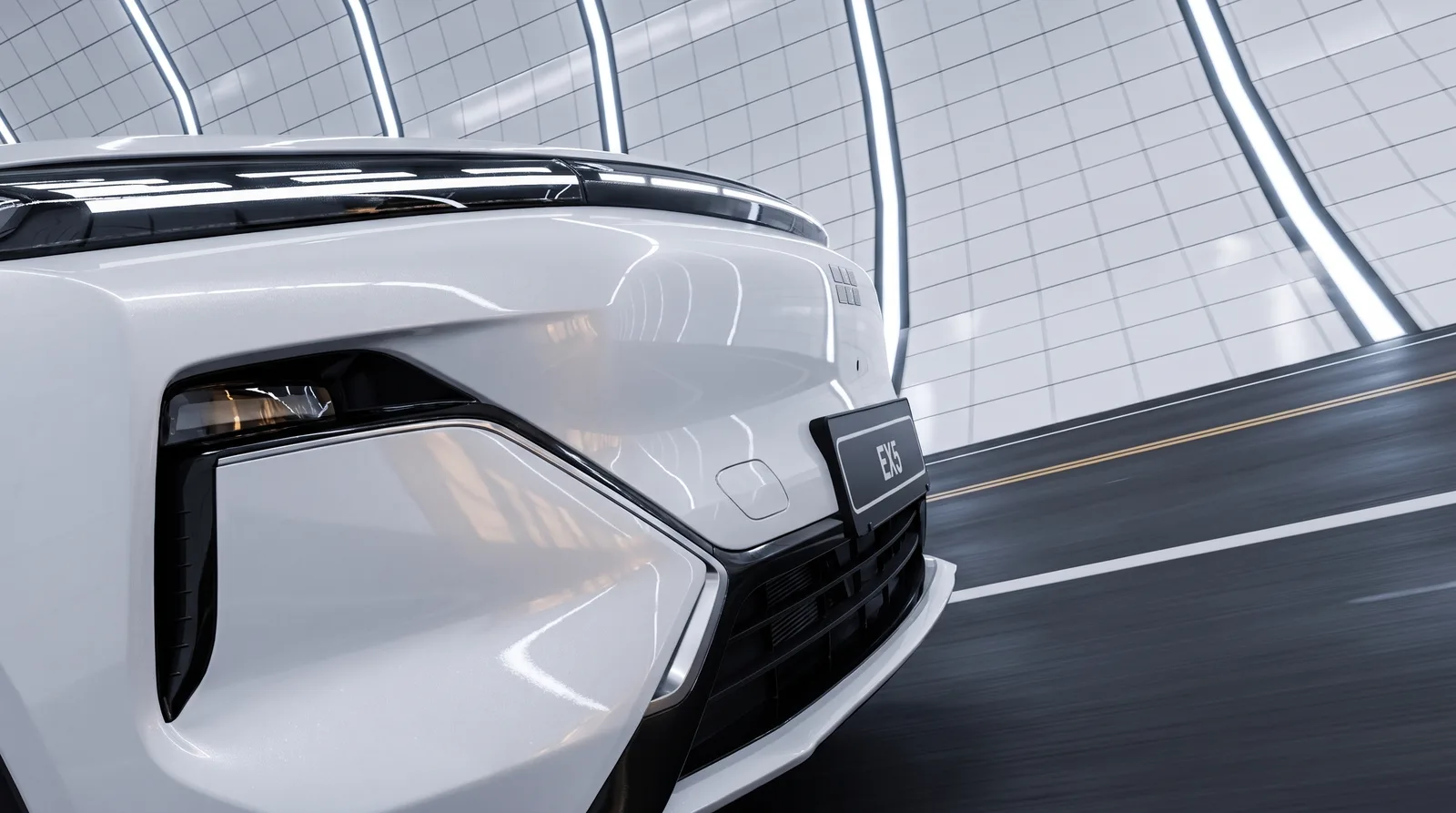Front-quarter detail of a white EX5 in a tiled tunnel